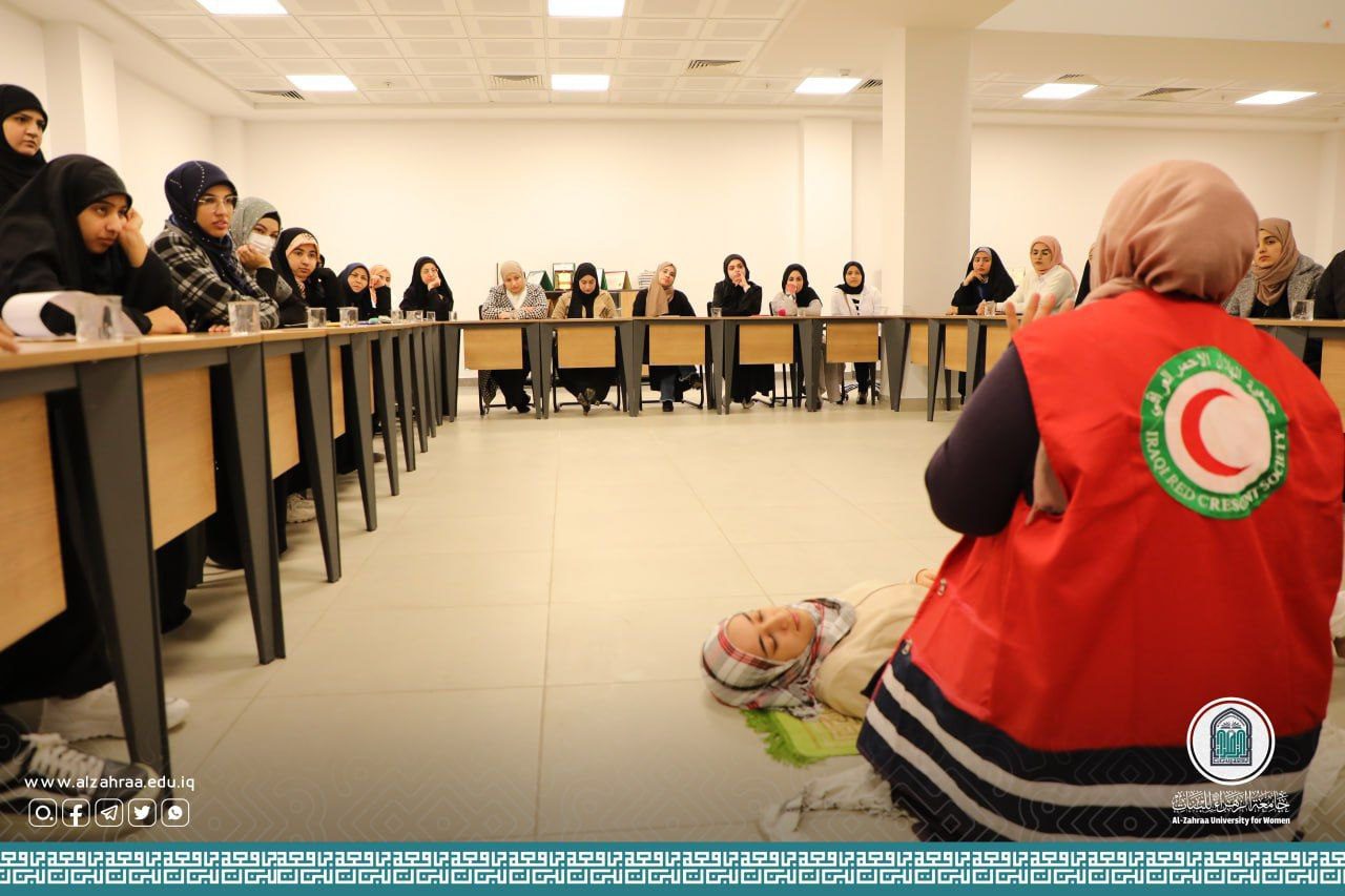 The Iraqi Red Crescent Society holds a first aid course at Al-Zahraa University (peace be upon her) for women.